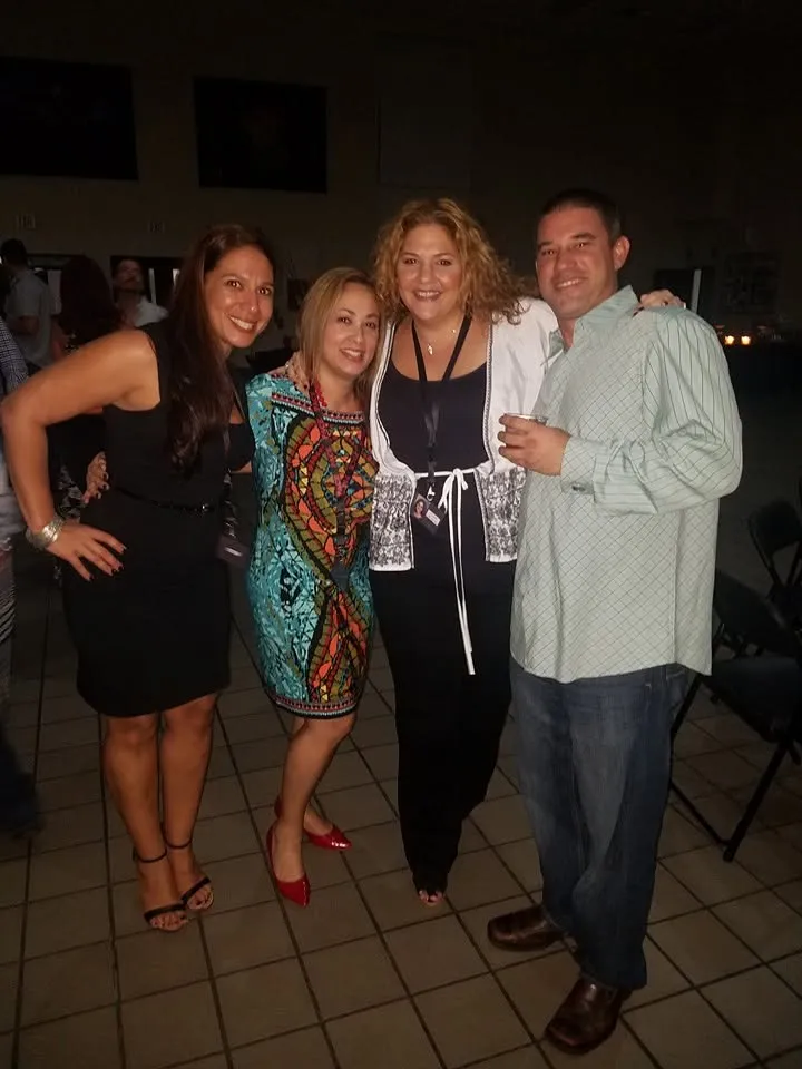 Four classmates at a reunion