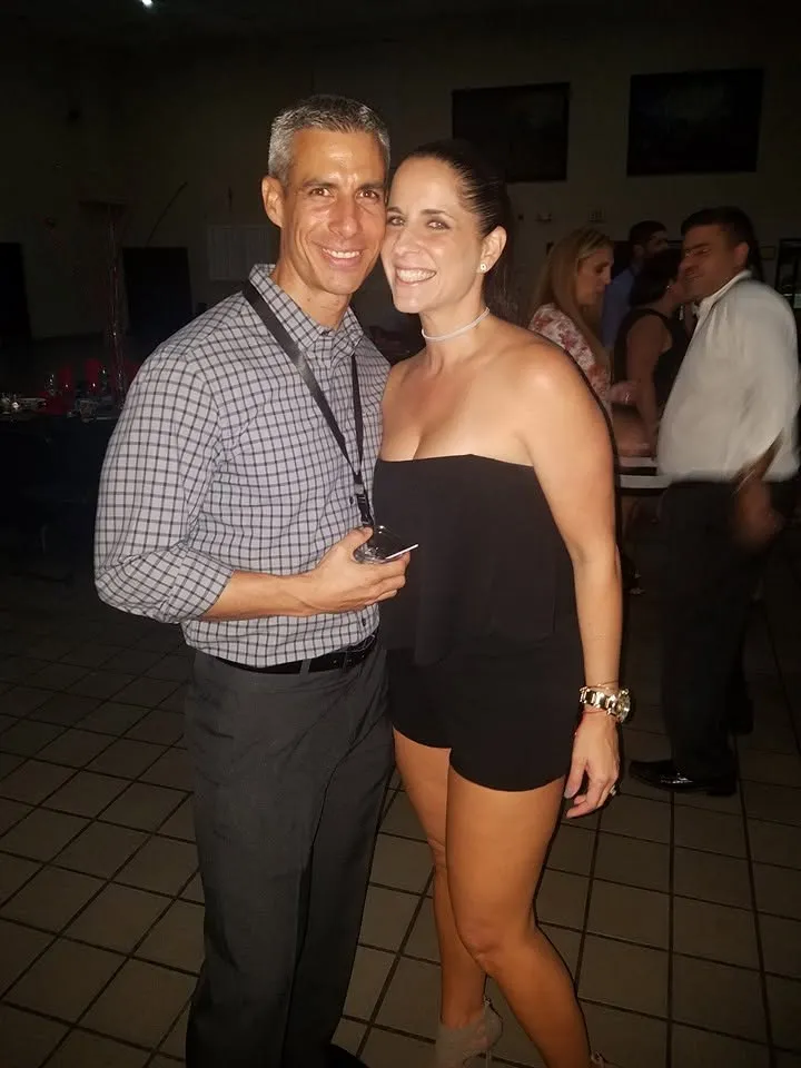Two classmates at a reunion