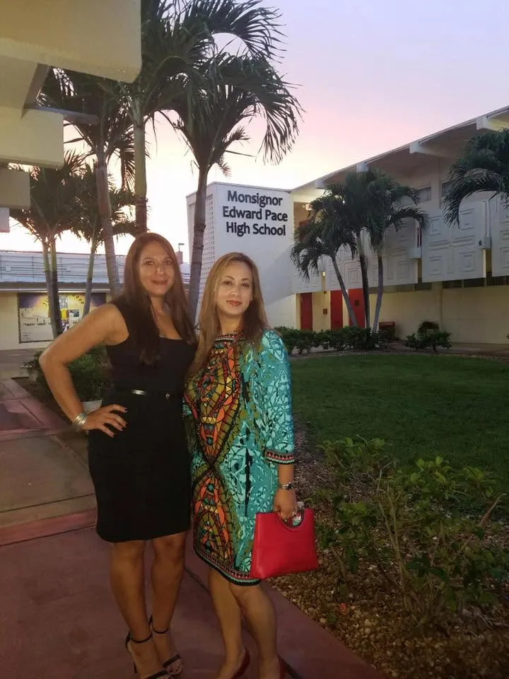 Two classmates outside Pace at sunset