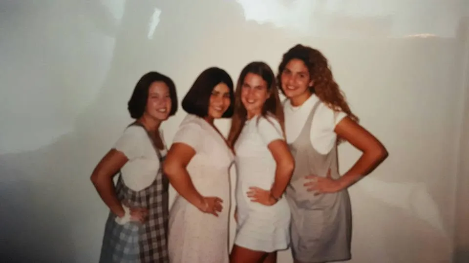 Four friends posing in Pace uniforms