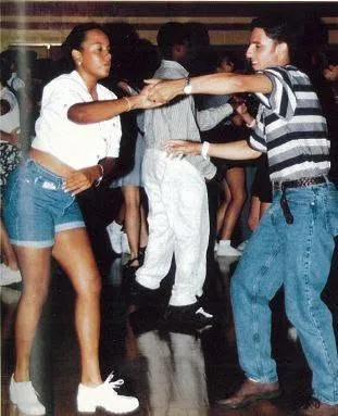 Classmates dancing at a school dance